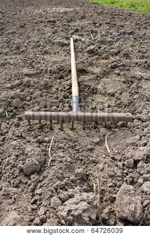 Rakes And Black Earth