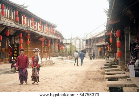 Tourists Walking In Shuhe Ancient Town.