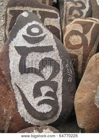 stone carved with symbols of prosperity_21