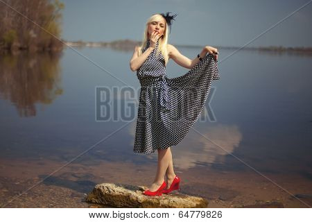 Girl Standing On Stone In The River