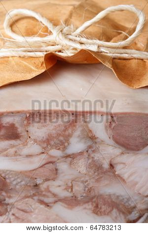 Headcheese Wrapped In Paper Macro Vertical
