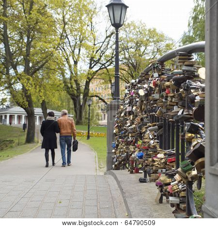 padlocks on bridge of lovers