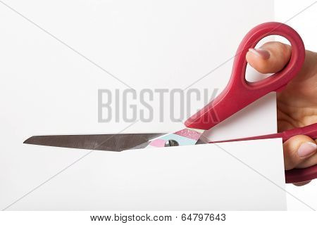 Scissors Cutting Piece Of Paper