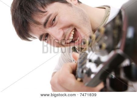 Handsome Young man Gitarre spielen