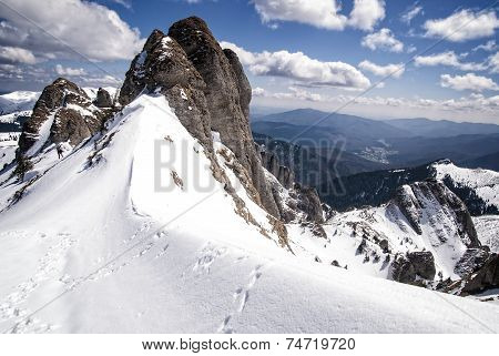 Snowy peaks of a mountain
