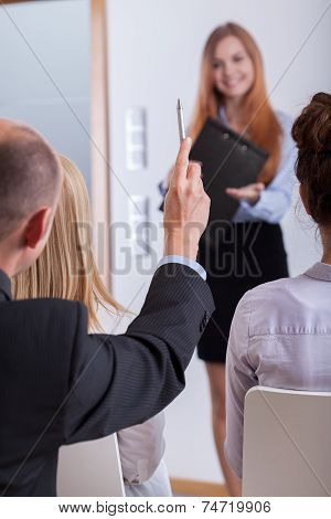 Man Raising The Hand