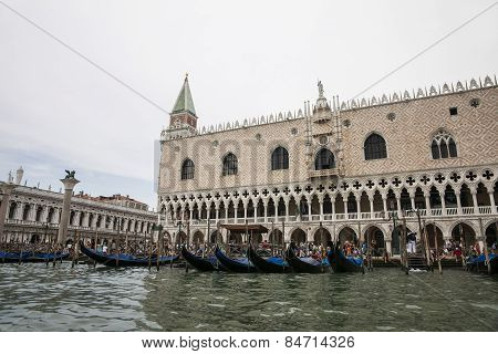 Gondolas Parking Near Doges Palace In Summer Venice