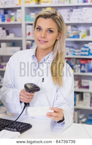 Pharmacist scanning medicines at the hospital pharmacy