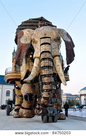 NANTES, FRANCE - CIRCA DECEMBER 2009: The Great Elephant goes for a walk with passengers aboard.