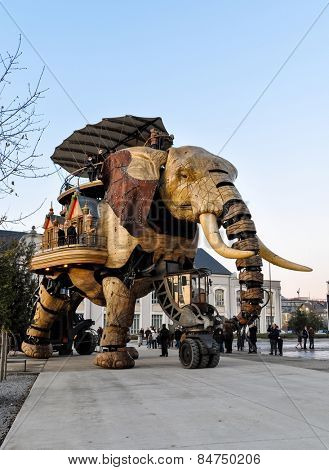 NANTES, FRANCE - CIRCA DECEMBER 2009: The Great Elephant goes for a walk with passengers aboard.