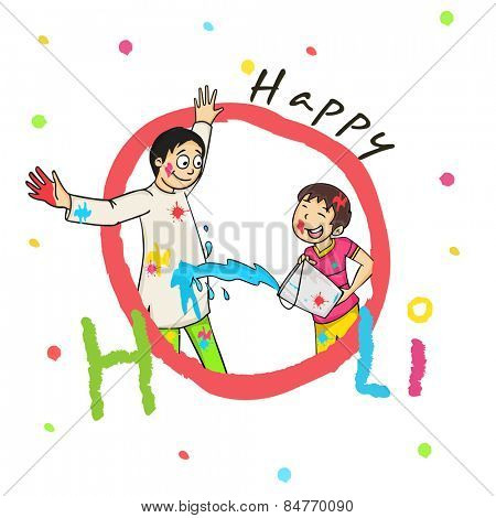 Cute little boy throwing color on his father on occasion of Indian festival, Holi celebration.