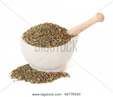 Pagoda tree bud herb used in chinese herbal medicine in a stone mortar with pestle over white background. Huai hua mi.