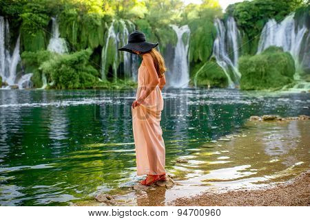 Woman tourist near Kravica waterfall