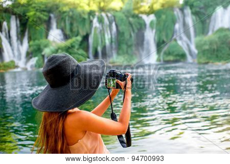 Woman tourist near Kravica waterfall