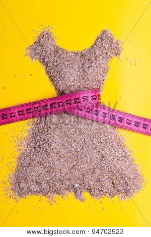 Dress Shape Made From Bran With Measure Tape