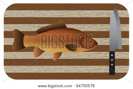 Fish And  Knife On A Chopping Board. Top View.