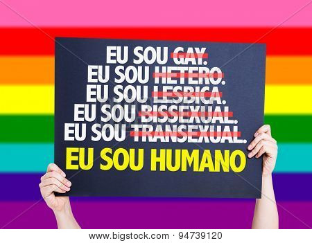 I am Gay/Straight/Lesbian/Bisexual/Trans I am Human (in Portuguese) card with rainbow flag on background