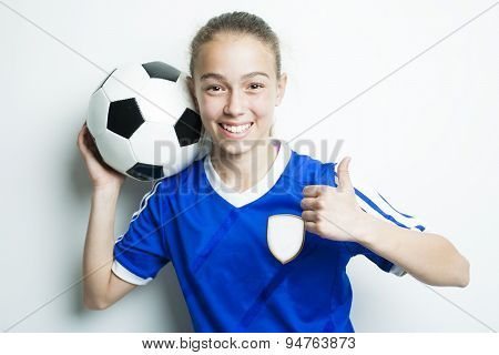 girl in sport wear with football isolated on white background