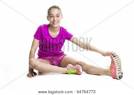 running young girl in sport cothes, white background