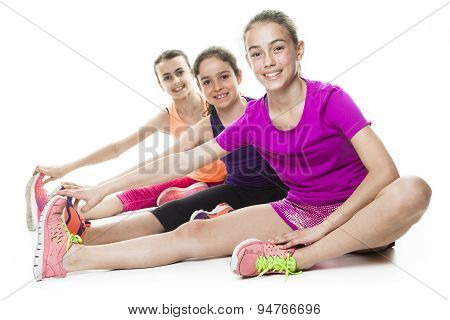 running young girl in sport cothes, white background