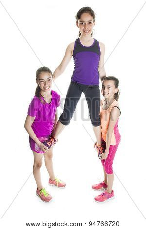 running young girl in sport cothes, white background