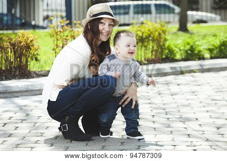 Young mother with her baby boy
