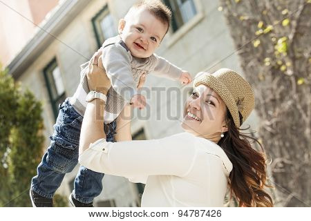 Young mother with her baby boy