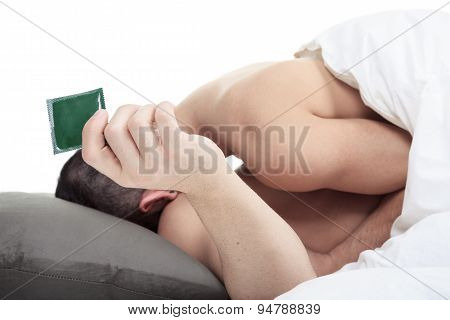 A homosexual couple onder a bed in studio white