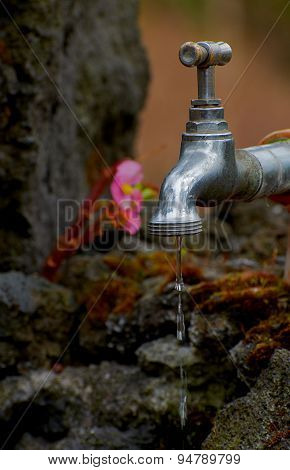 Faucet with water drops