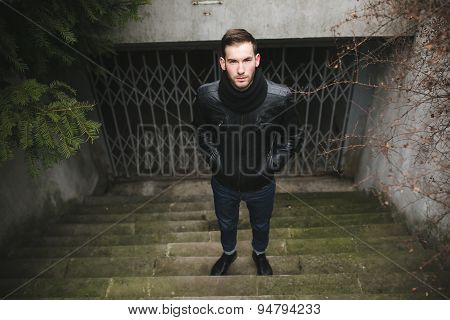 Confident man posing in selvedge  jeans