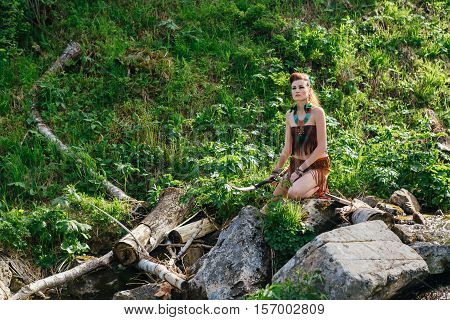 Young Beautiful Amazon Girl Hunting In The Forest