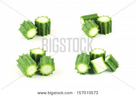 fresh angled Loofah or angled gourd on white background