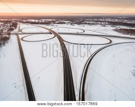 winter road junction in the countryside aerial view  in the form of butterfly