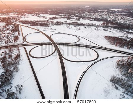 winter road junction in the countryside aerial view  in the form of butterfly