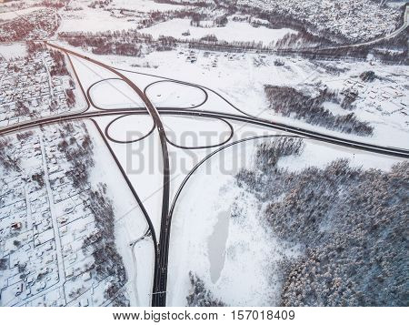 winter road junction in the countryside aerial view  in the form of butterfly
