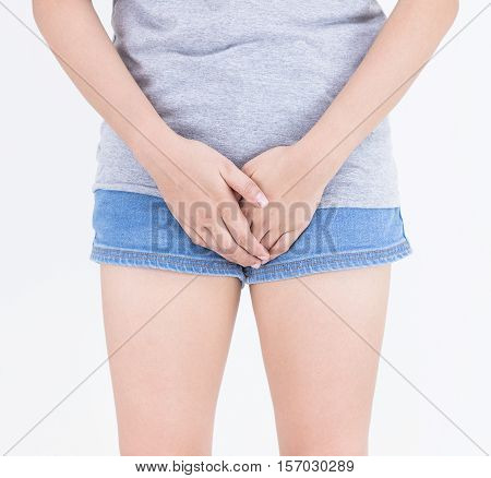 Women with hands holding her crotch Concept with healthcare and medicine.