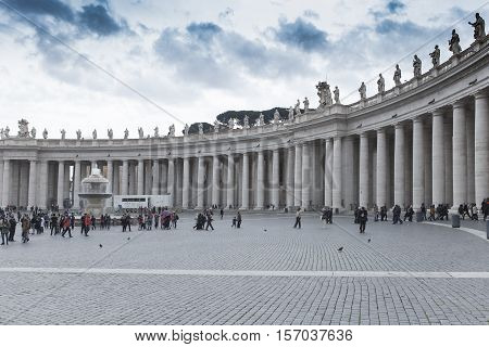 ST.PETER VATICAN ROME ITALY - NOVEMBER 8 : tourist taking a photo in front of stpeter basilica church on november 8 2016 in rome italy