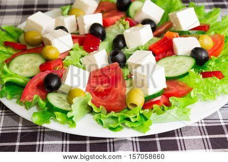 Greek salad with feta cheese and olives