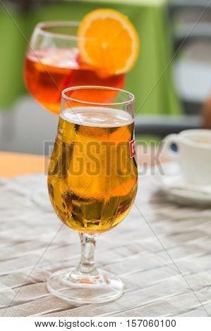 Traditional Spritz aperitif and beer in a bar in Italy