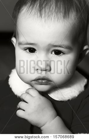 Portrait of cute little baby girl smiling Isolated on black background
