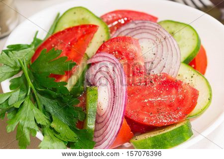Salad with tomatoes and cucumbers for diet
