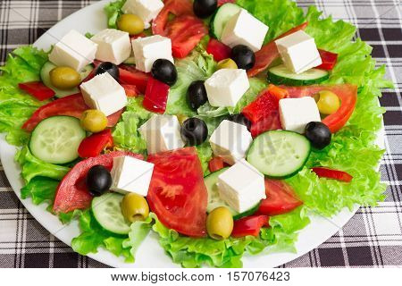 Greek salad with feta cheese and olives
