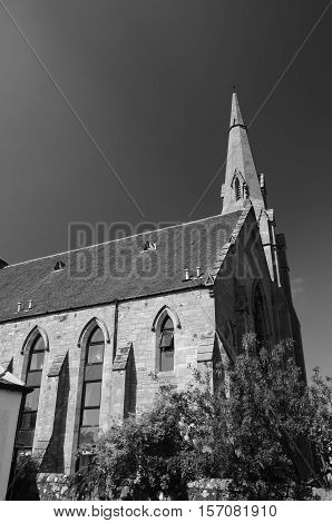 A view of a tall church spire in Milnathort