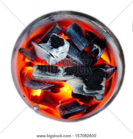 Burning coals. Decaying charcoal. Texture embers closeup. burning charcoal in the background