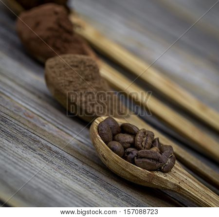 Beautiful Little Wooden Spoon With Coffee On  Background
