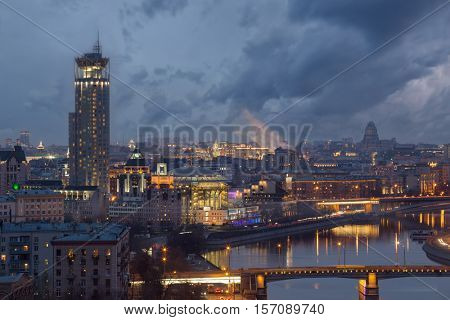 Novospassky bridge, Moscow river, House of music and evening panorama of Moscow, Russia