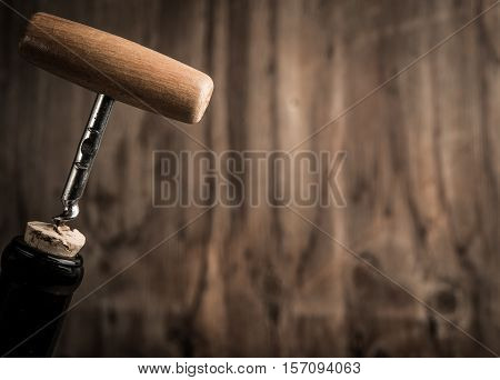 Cork Screw And Wine Bottleopening A Wine Bottle With A Corkscrew In A Restaurant