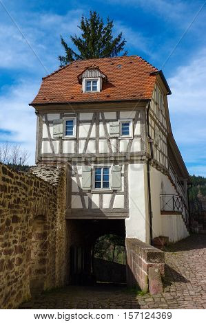 Residential tudor style house with blue sky in background. Castle Neuenbuerg in Germany.