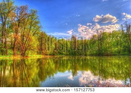 Autumn Landscape. Park in Autumn. The bright colors of autumn in the park by the lake.