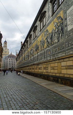 DRESDEN GERMANY - JULY 13 2015: the city center with historic buildings and the Fuerstenzug Procession of Princes a giant mural